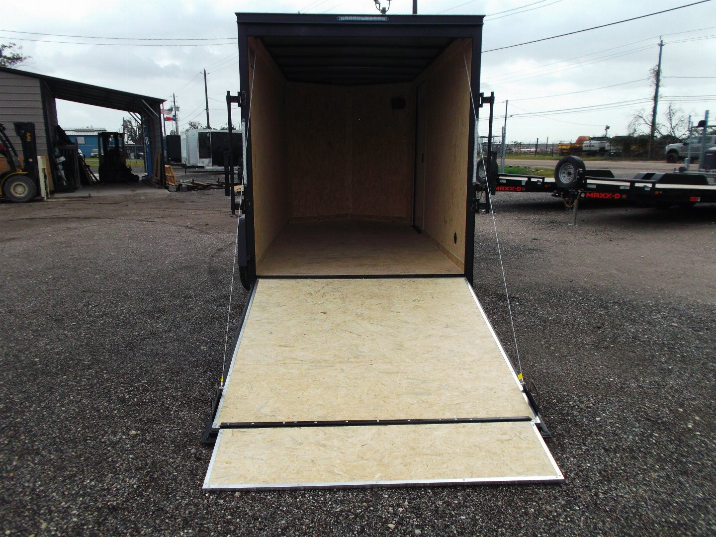 New 2026 Covered Wagon Trailers 6x10 Cargo / Enclosed Trailer / 6'6" Interior / Extra Wide Ramp / RV Side Door / LEDs / .030 Silver Semi-Screwless Exterior / Black Out Package