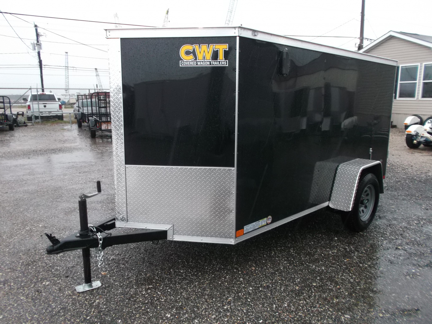 Used USED 2026 Covered Wagon Trailers 5x10 Single Axle Cargo Trailer / Enclosed Cargo Trailer / Double Rear Barn Doors/ RV Side Door / Bed Lined Tongue and Frame / .030 Black Semi-Screwless Exterior