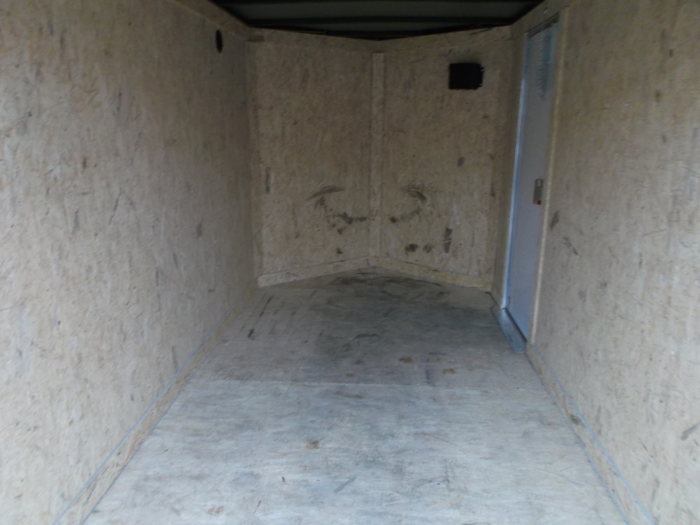 Used USED 2026 Covered Wagon Trailers 5x10 Single Axle Cargo Trailer / Enclosed Cargo Trailer / Double Rear Barn Doors/ RV Side Door / Bed Lined Tongue and Frame / .030 Black Semi-Screwless Exterior