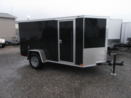 Used USED 2026 Covered Wagon Trailers 5x10 Single Axle Cargo Trailer / Enclosed Cargo Trailer / Double Rear Barn Doors/ RV Side Door / Bed Lined Tongue and Frame / .030 Black Semi-Screwless Exterior