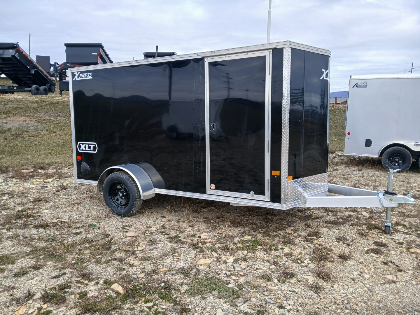 New 2026 ALCOM Xpress 6'x12' / SA XLT Pro Series / 2,990 GVWR / Aluminum Enclosed Trailer