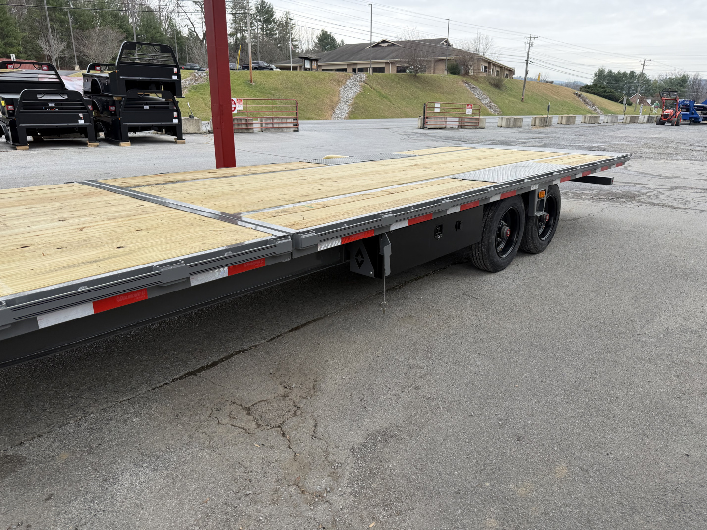 New 2026 Diamond C DET210 DECK OVER POWER TILT TRAILER WITH HYDRO JACKS & REMOTE