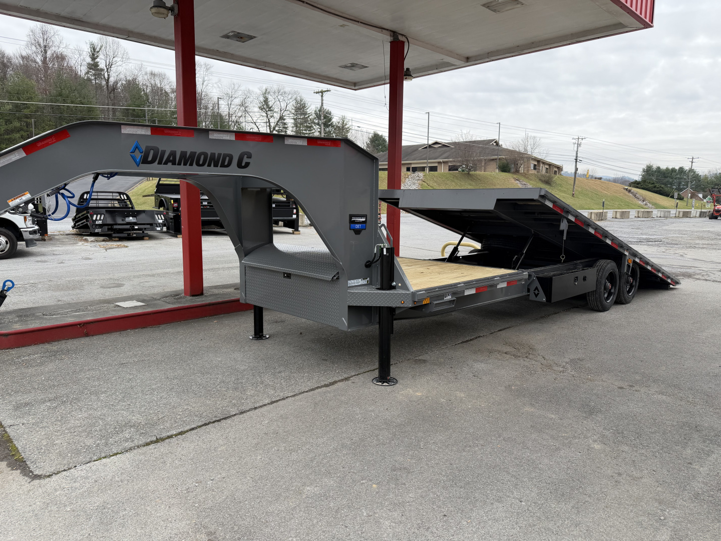 New 2026 Diamond C DET210 DECK OVER POWER TILT TRAILER WITH HYDRO JACKS & REMOTE