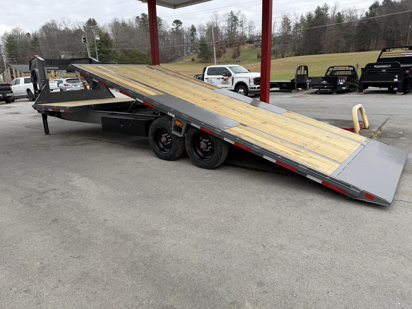 New 2026 Diamond C DET210 DECK OVER POWER TILT TRAILER WITH HYDRO JACKS & REMOTE