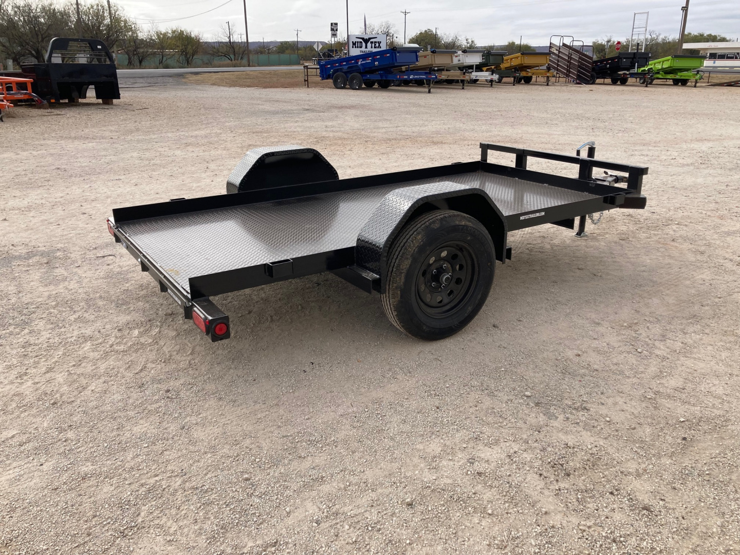 New 2026 Top Hat 10'x60" WM Utility Trailer