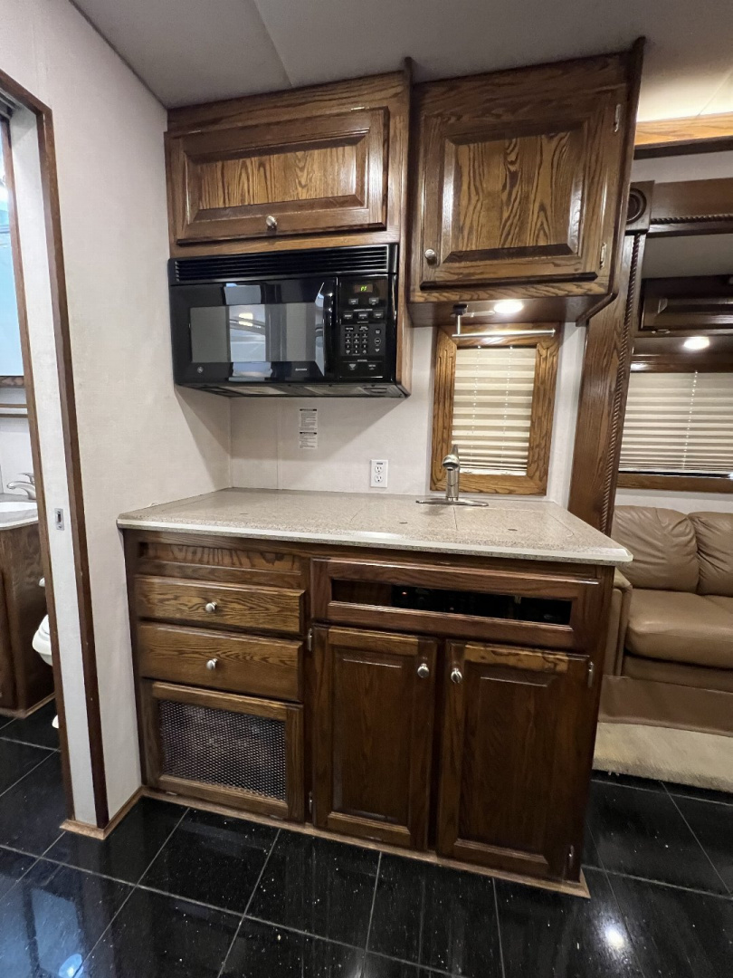 Used 2004 Renegade Tandem Axle Toter 23’ Box w/ Rear Bedroom