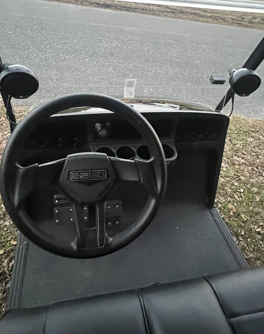 Used 2025 EZGO TXT Gas Golf Cart - Black