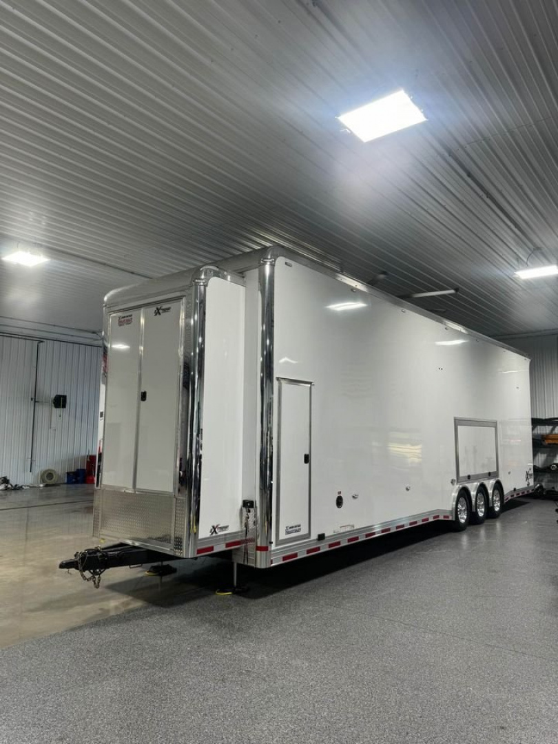 Used Custom built 2023 United Trailer Extreme 36’ 3 car stacker