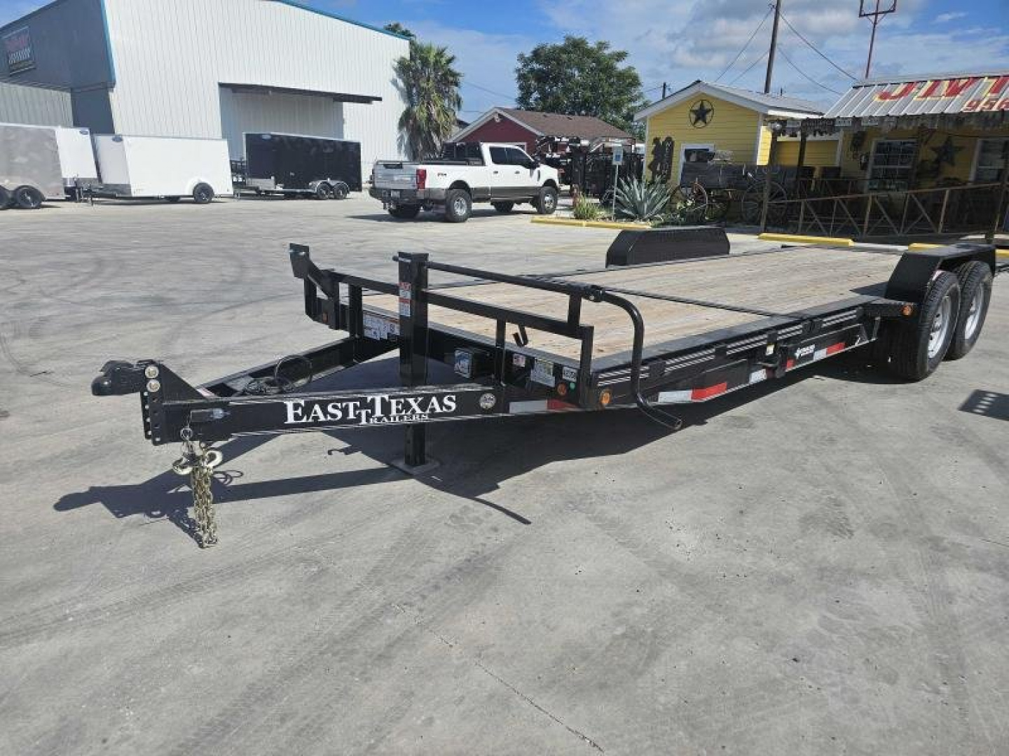 New 2025 East Texas Trailers 83X22 TILT CARHAULER Tilt Trailer