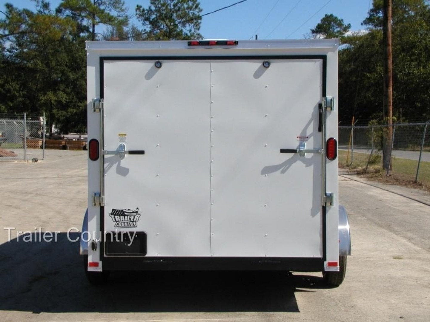 New 2026 New 7x16 Tandem Axle, V-Nosed Enclosed Trailer.