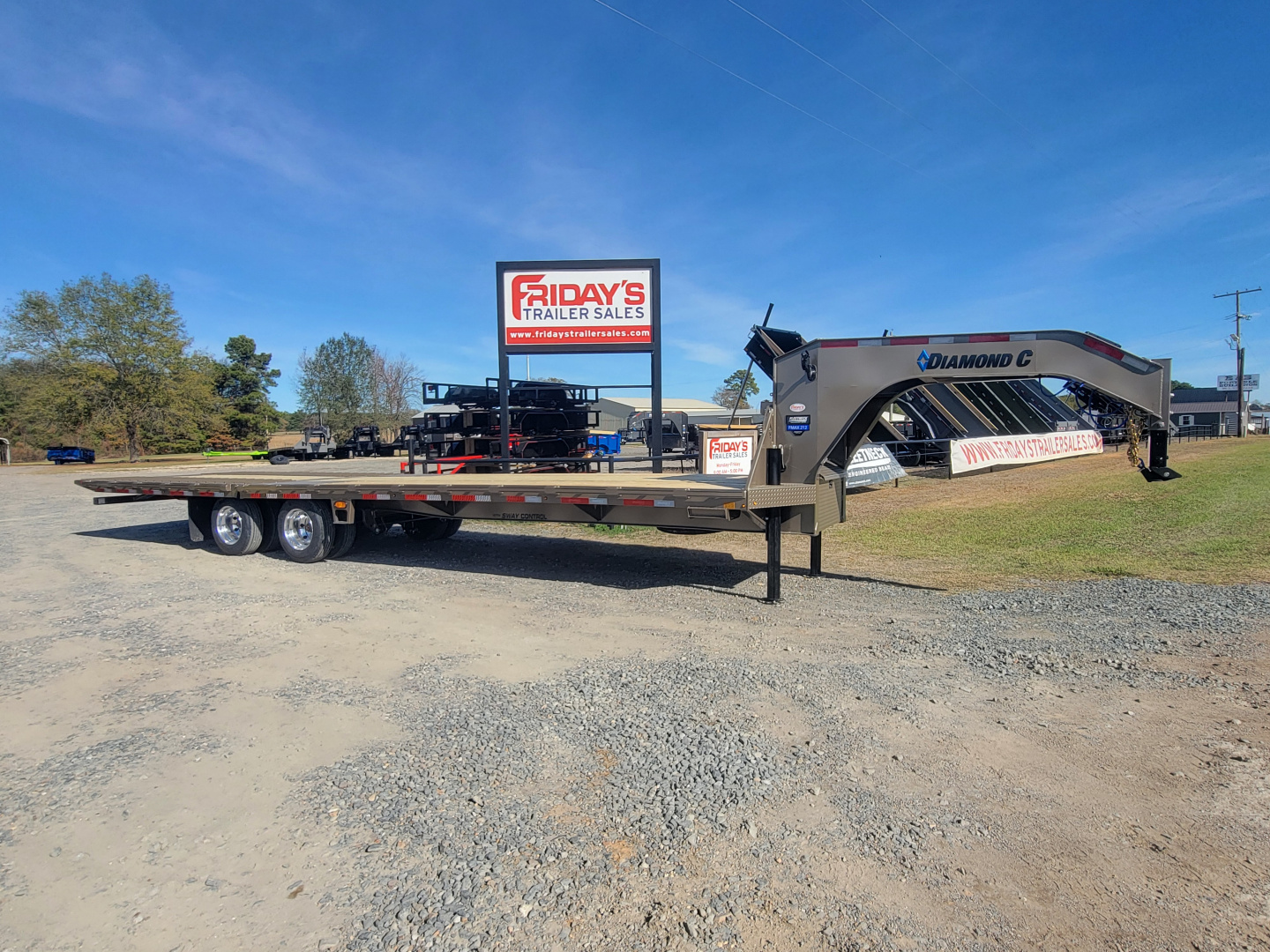 New 2026 Diamond C Trailers FMAX212 32' x 102" Hydraulic Dovetail Pacesetter Edition