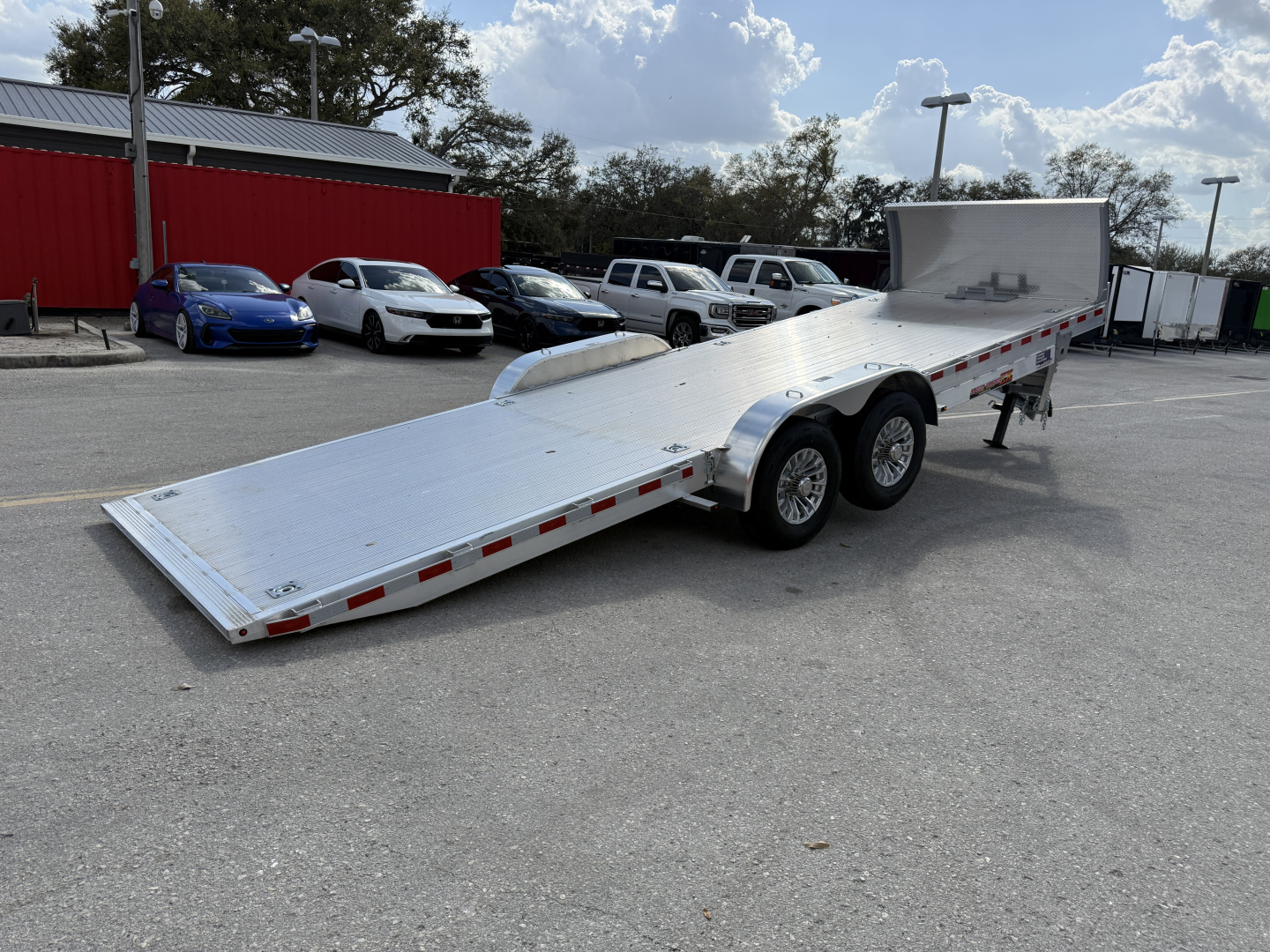 New 2026 H&H Trailers 82x24 Aluminum Electric Tilt Speed Loader 14K Car Hauler