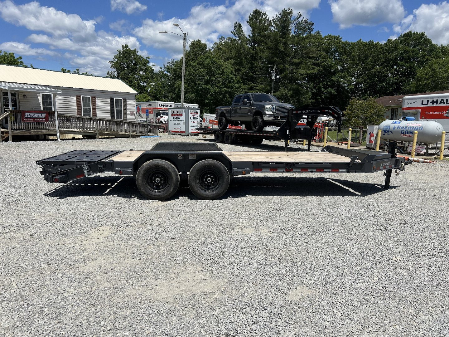 New 2025 Iron Bull EWB Series Equipment Trailer / 83"x22 / 2-7,000# Electric Brake Axles / Rampage Ramps / Jumbo Toolbox