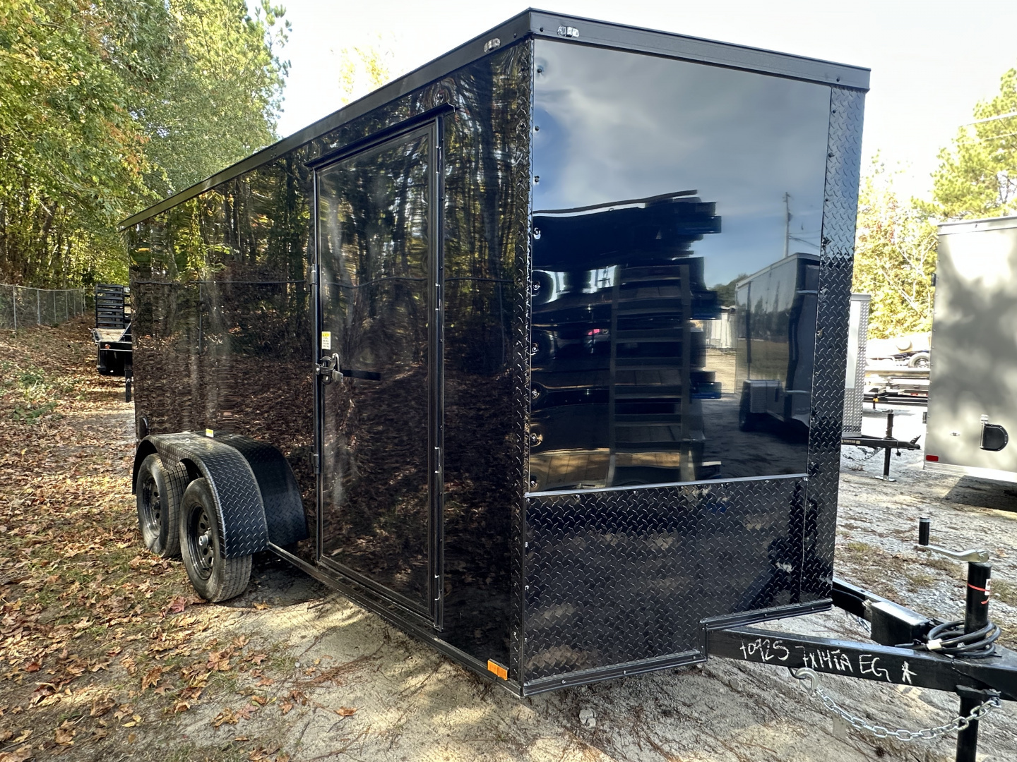 New 2026 QUALITY CARGO 7X14 TANDEM AXLE ENCLOSED TRAILER WITH REAR SPOILER AND BLACKOUT PACKAGE