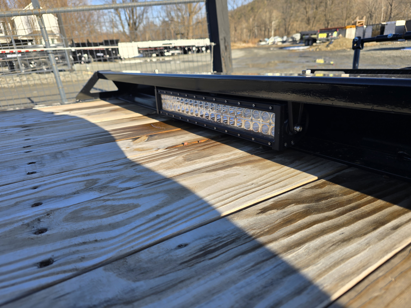 New 2026 Sure-Trac 7x18+4 17.6K Tilt Equipment Trailer- HD Bulkhead with Integrated Tie Downs- Spare Tire Carrier- Toolbox with Interior Light- Hydraulic Dampener with Stop Valve