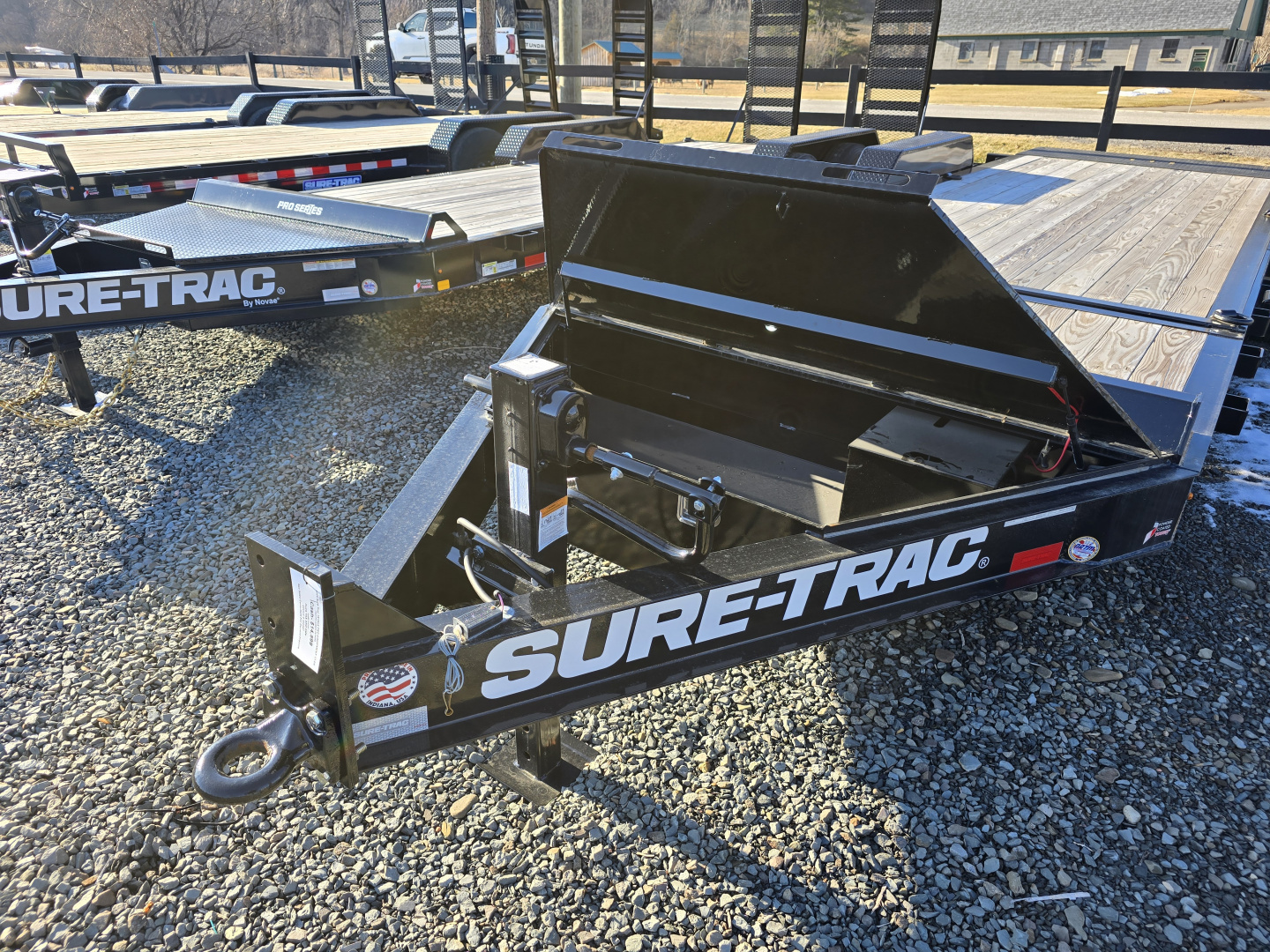 New 2026 Sure-Trac 7x18+4 17.6K Tilt Equipment Trailer- HD Bulkhead with Integrated Tie Downs- Spare Tire Carrier- Toolbox with Interior Light- Hydraulic Dampener with Stop Valve