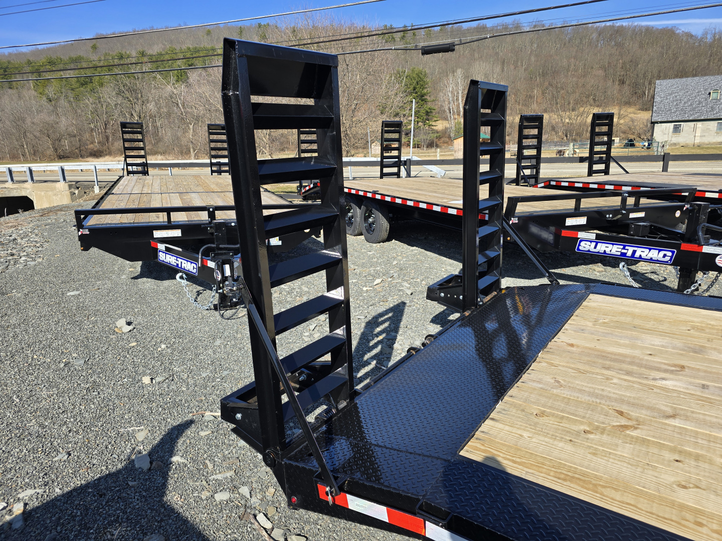 New 2026 Sure-Trac 8.5x20+2 Full Width Implement Trailer- HD Tube Bulkhead- Extended Tongue- Spare Tire Carrier- Stand Up Ramps with Adjustable Supports- Reinforced Diamond Plate Fenders- Pressure Treated Decking