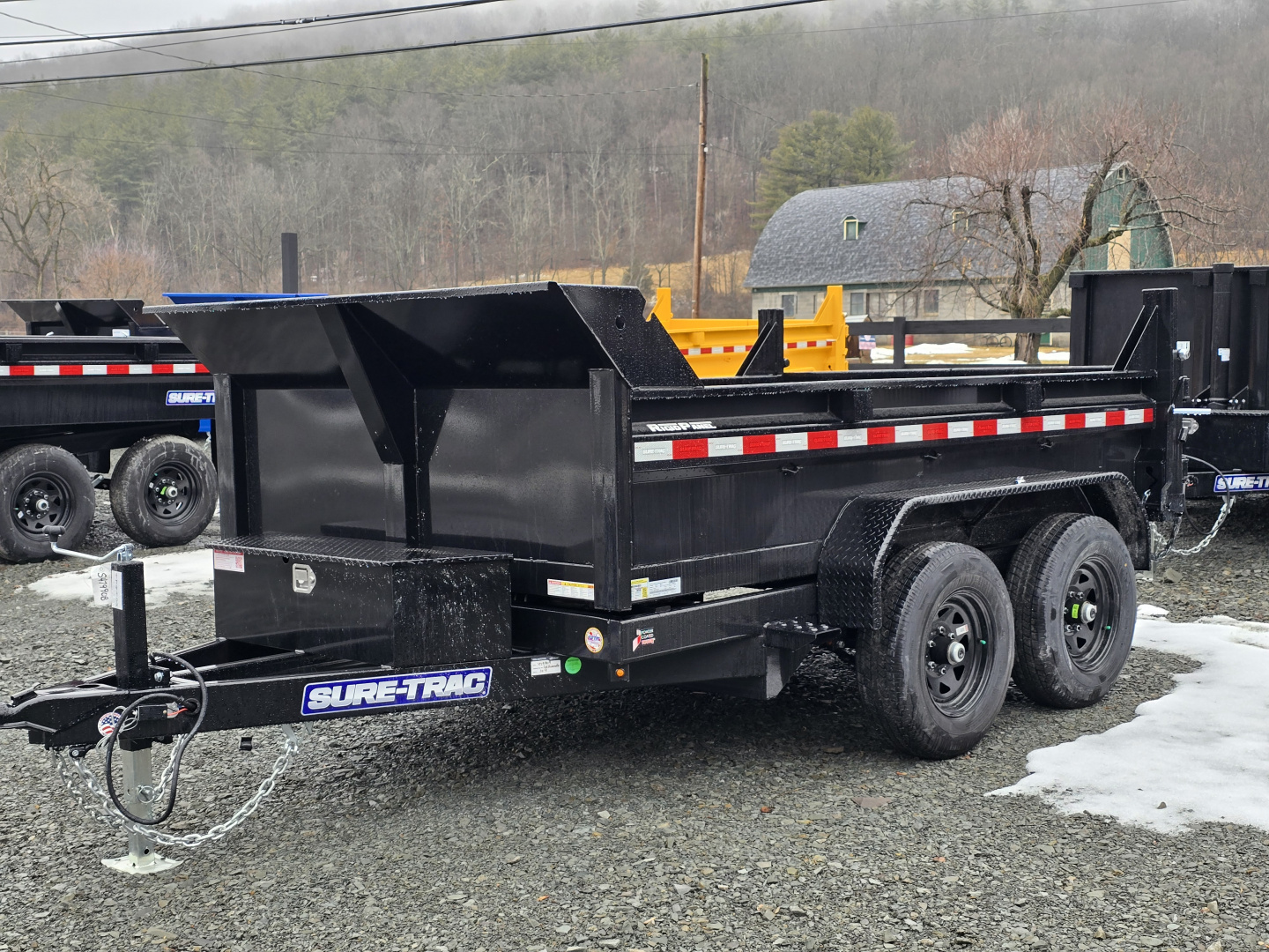 New 2026 Sure-Trac 6x10 10K Dump Trailer- Ramps- Combo Gate- Spare Tire Carrier- Stake Pockets- Integrated Tarp Mount