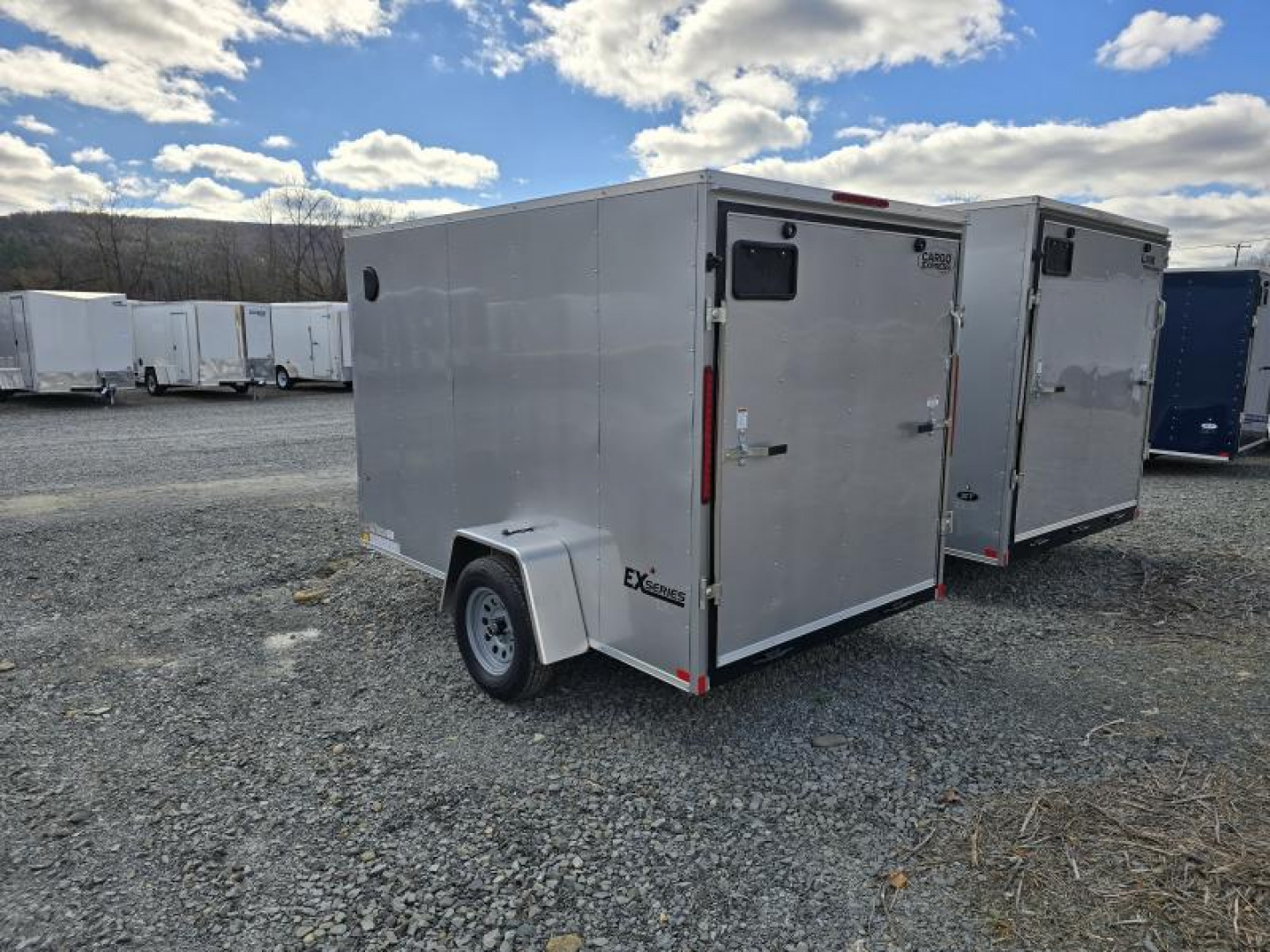 New 2025 Cargo Express KE7210STSV-030 EX DLX Cargo / Enclosed Trailer 6X10 3K * RAMP * 6FT INTERIOR *