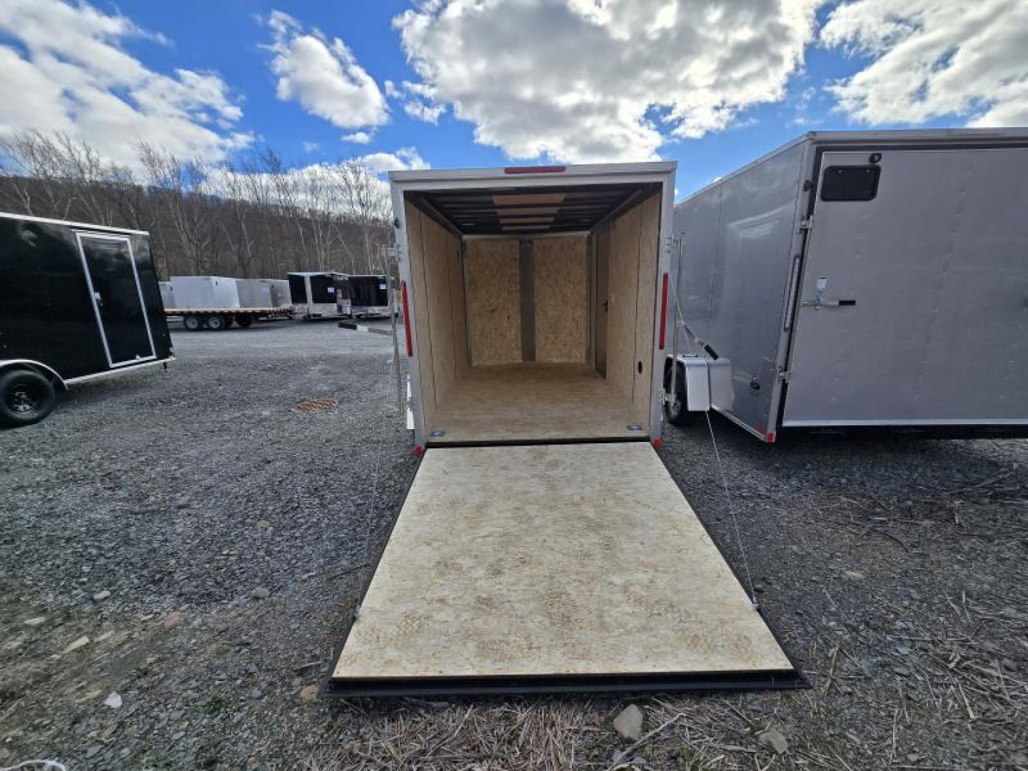 New 2025 Cargo Express KE7210STSV-030 EX DLX Cargo / Enclosed Trailer 6X10 3K * RAMP * 6FT INTERIOR *