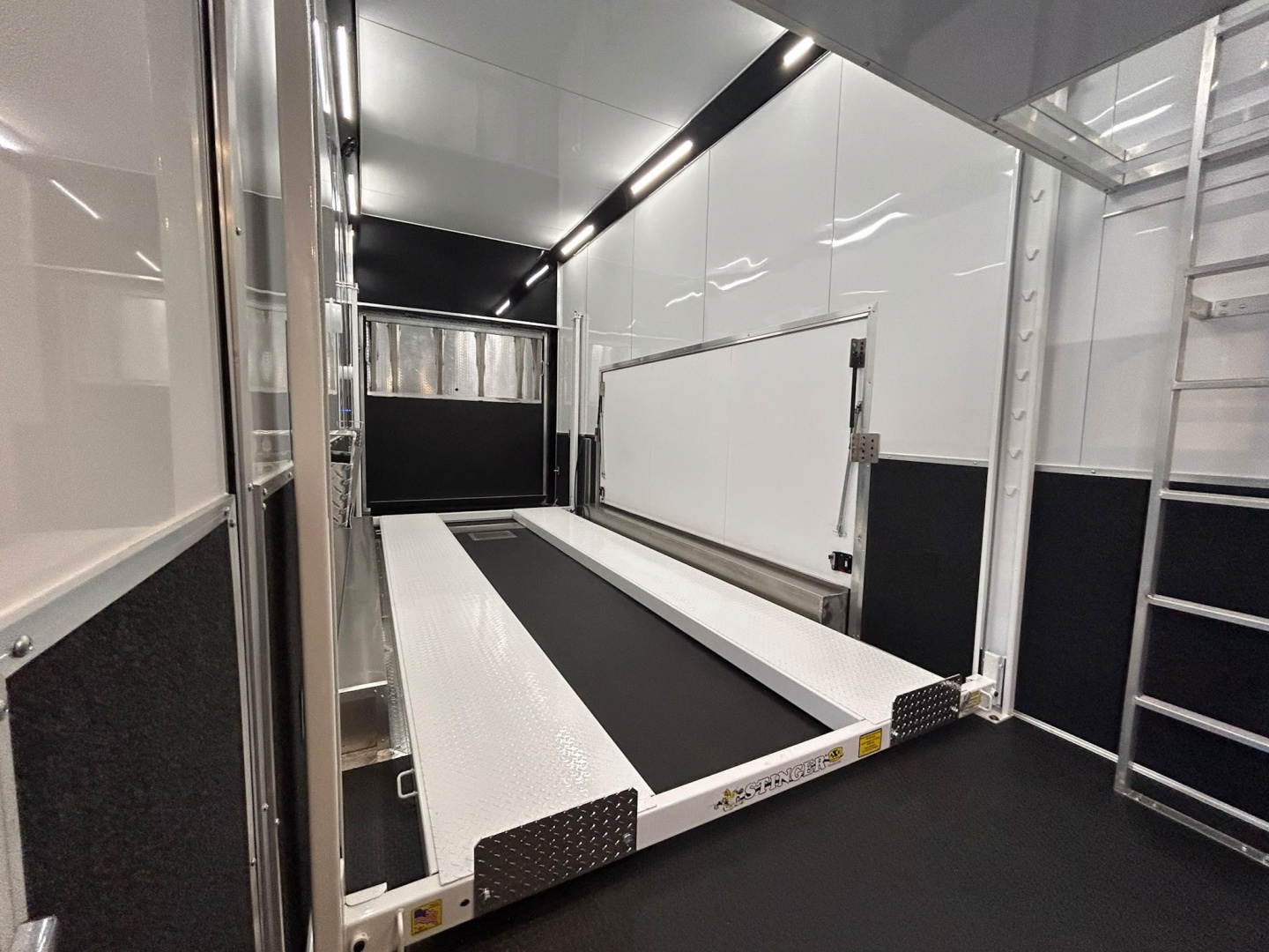 New 2026 Haulmark 28 FT EDGE ALUMINUM STACKER TRAILER W/ ESCAPE DOOR AND AWNINGS