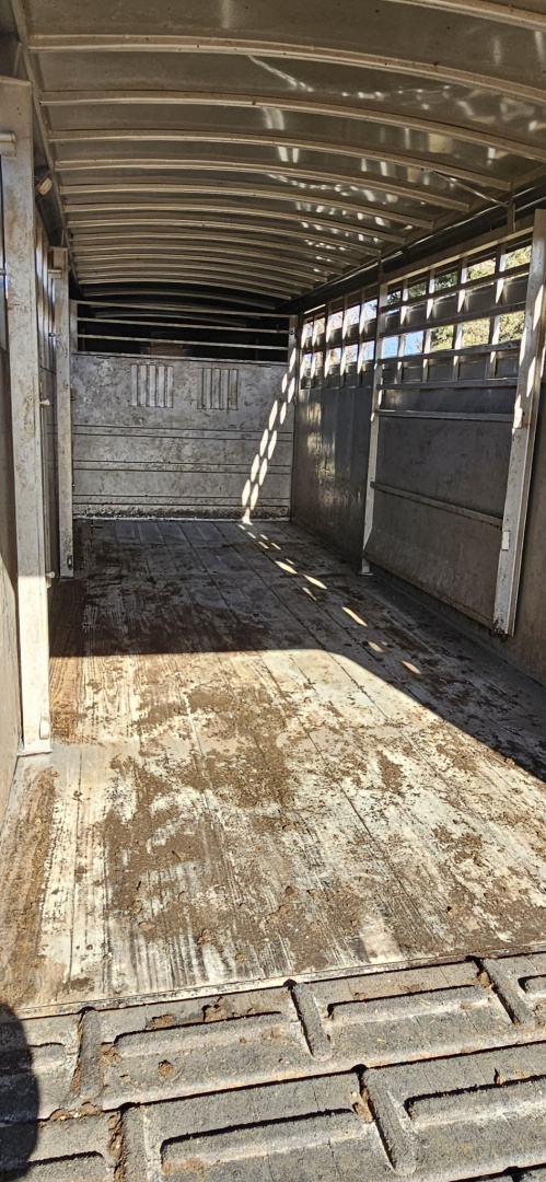 Used 2025 Titan Trailer Classic 6'8 x 24' Stock Trailer