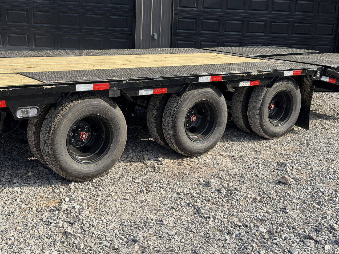 New 2026 Load Trail 102X32 GP TRIPLE 10K AXLES W/ MAX RAMPS 10 PLY TIRES Flatbed Trailer