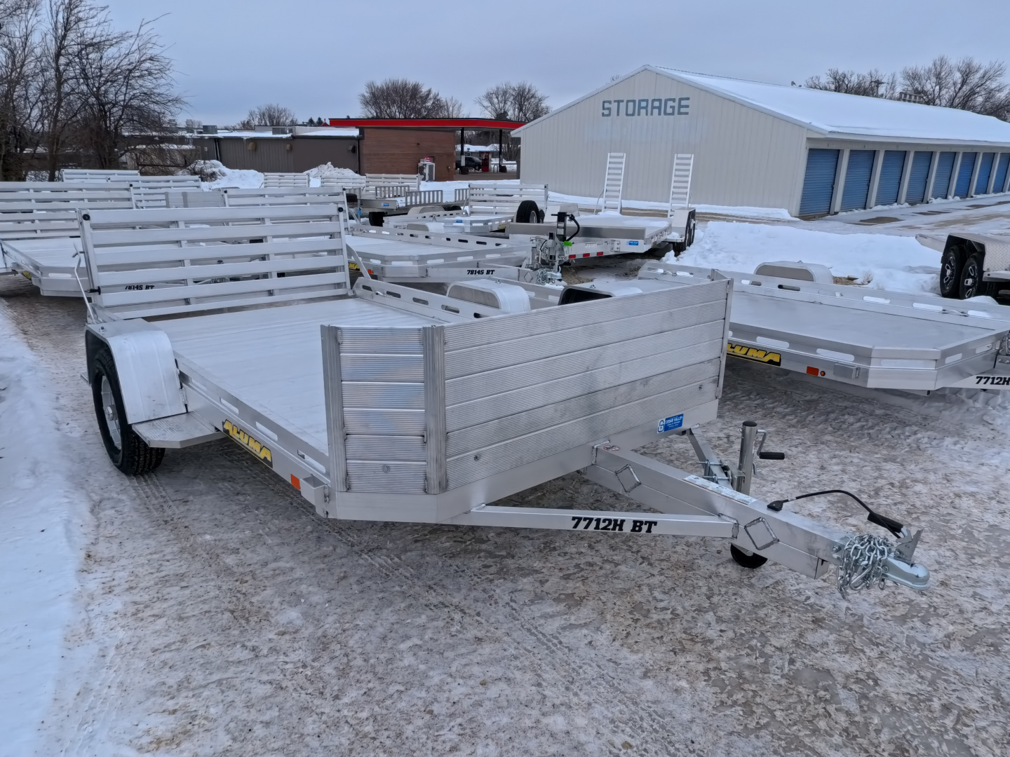New 2027 Aluma 77 x 12 Heavy Duty Single Axle with Rock Guard Front, Bi-Fold Tailgate and 2990 lb. GVWR