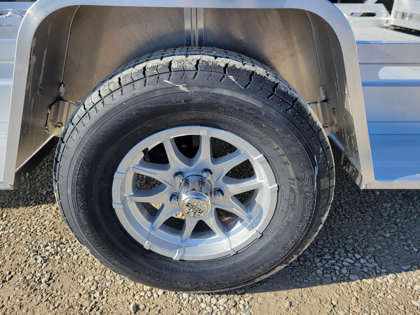 New 2026 Aluma 7712 Heavy Slotted Single Axle Bi-Fold Tailgate Utility Trailer