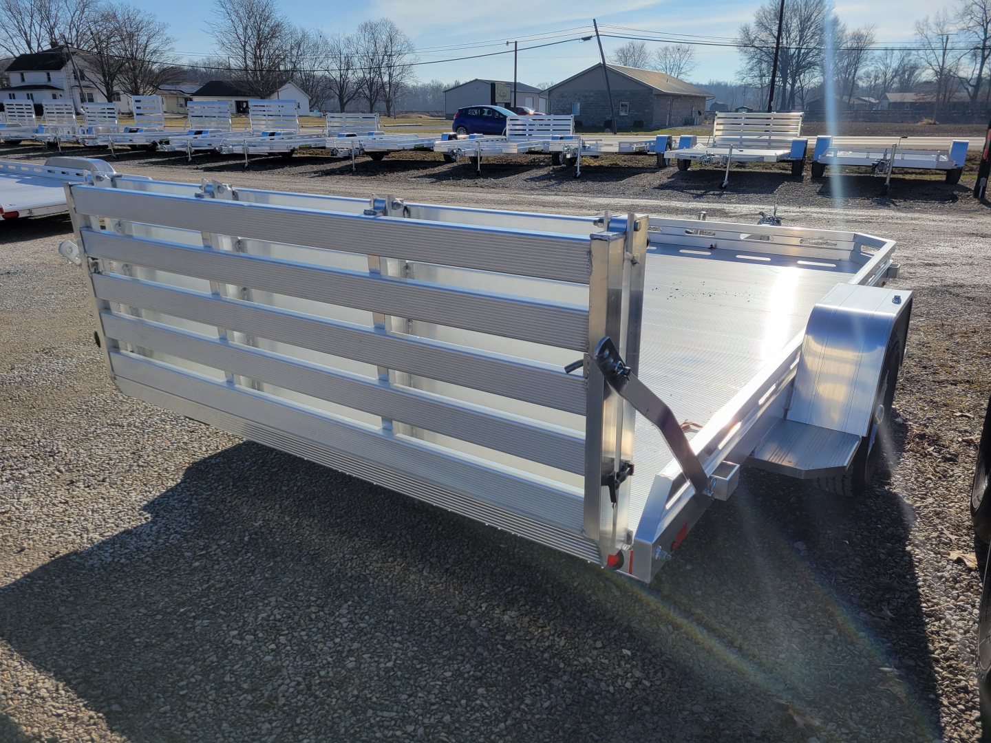 New 2026 Aluma 7712 Heavy Slotted Single Axle Bi-Fold Tailgate Utility Trailer