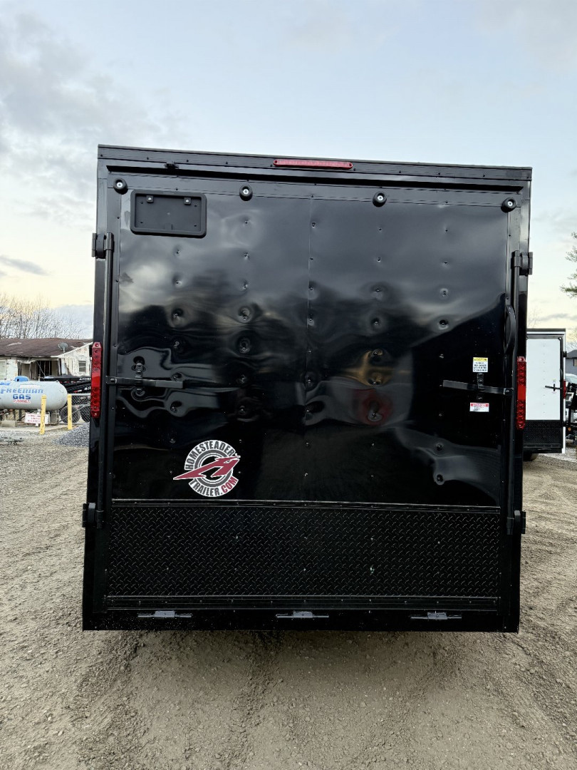 New 2026 Homesteader Trailers / 714IT Intrepid OHV / 7' Interior Height / .030 Black Aluminum w/ Black Out Pkg / Ramp Rear Door / 32" Side Door / 4-Recessed Floor D-Rings / ATP 24" High on sides and ramp door