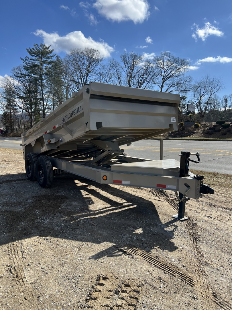 New 2026 Iron Bull Dump Trailer / DWB Series / 83" Wide x 14' Long / 2-7,000# Electric Brake Axles / Tarp / Aluminum Ramps / Combo Rear Gate / Desert Tan Powder Coat