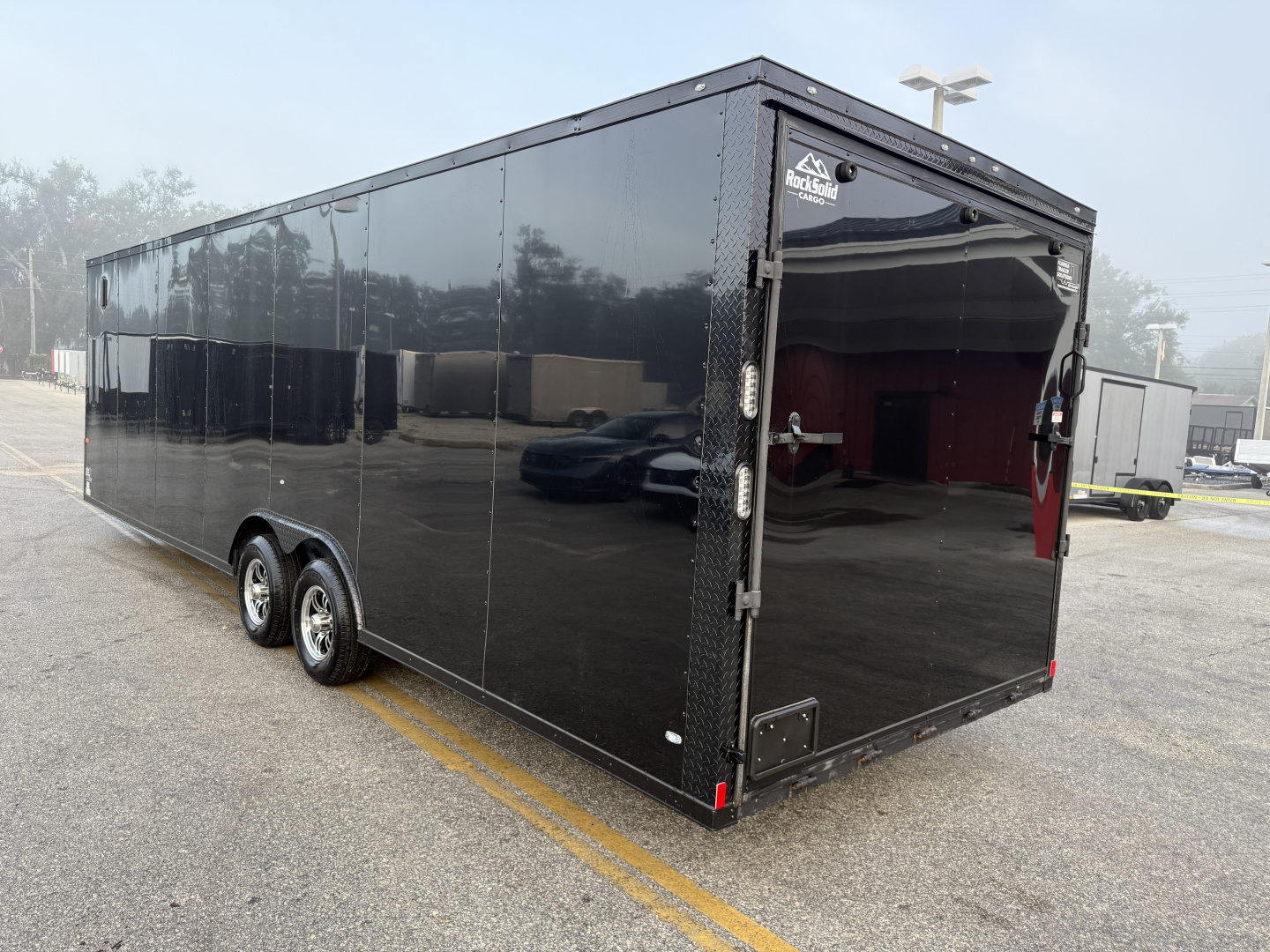 Used 2025 Rock Solid Cargo 8.5x28 10K Black Out Package Rear Ramp Door Car Hauler