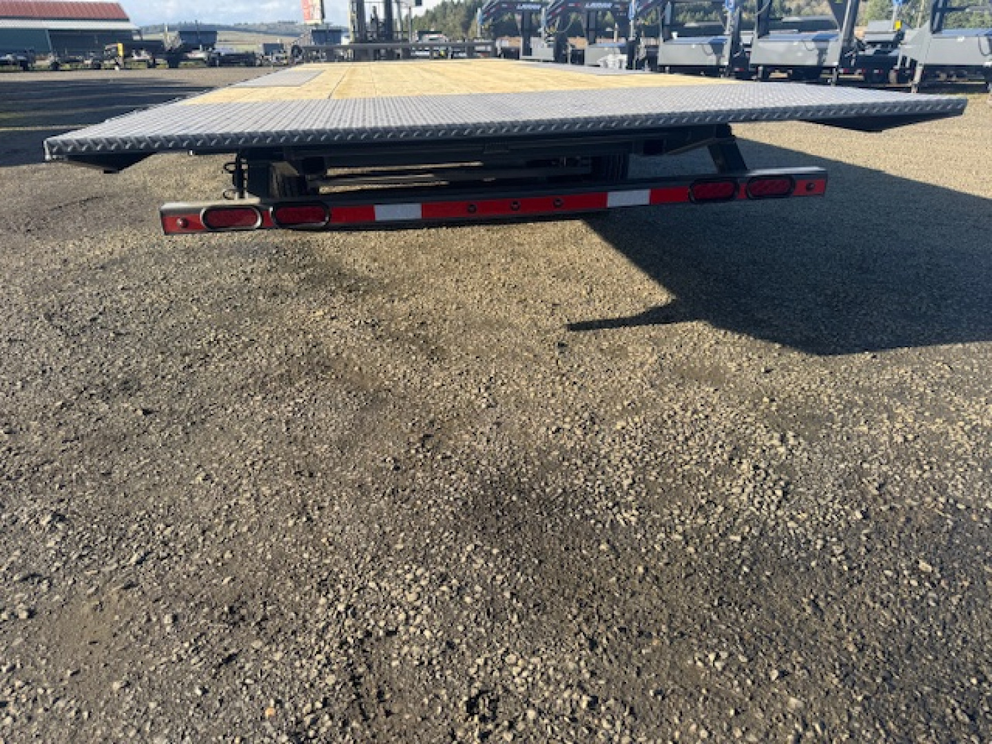 New 2026 LAMAR TRAILERS FA 102x26 21K Tilt Trailer