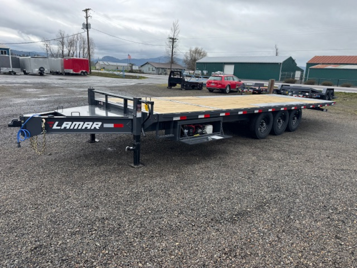 New 2026 LAMAR TRAILERS FA 102x26 21K Tilt Trailer