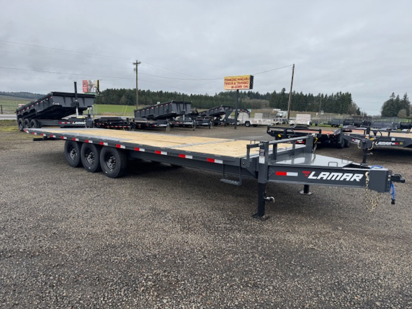 New 2026 LAMAR TRAILERS FA 102x26 21K Tilt Trailer