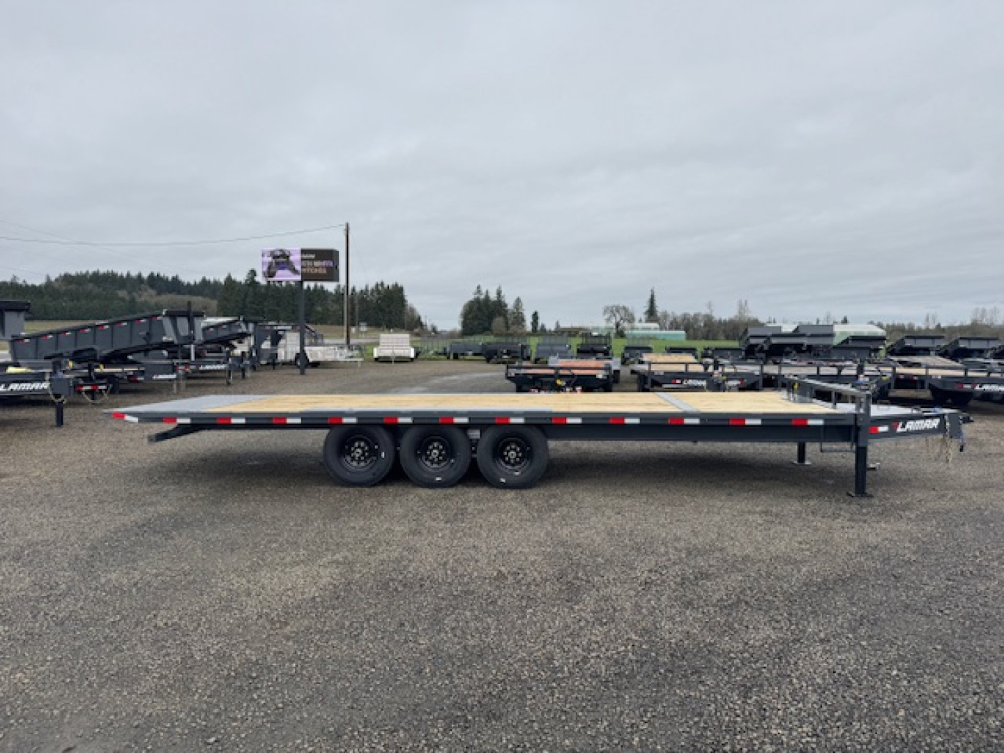 New 2026 LAMAR TRAILERS FA 102x26 21K Tilt Trailer