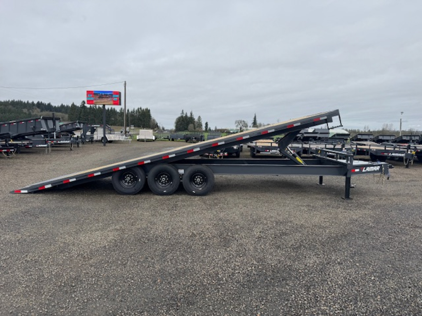 New 2026 LAMAR TRAILERS FA 102x26 21K Tilt Trailer