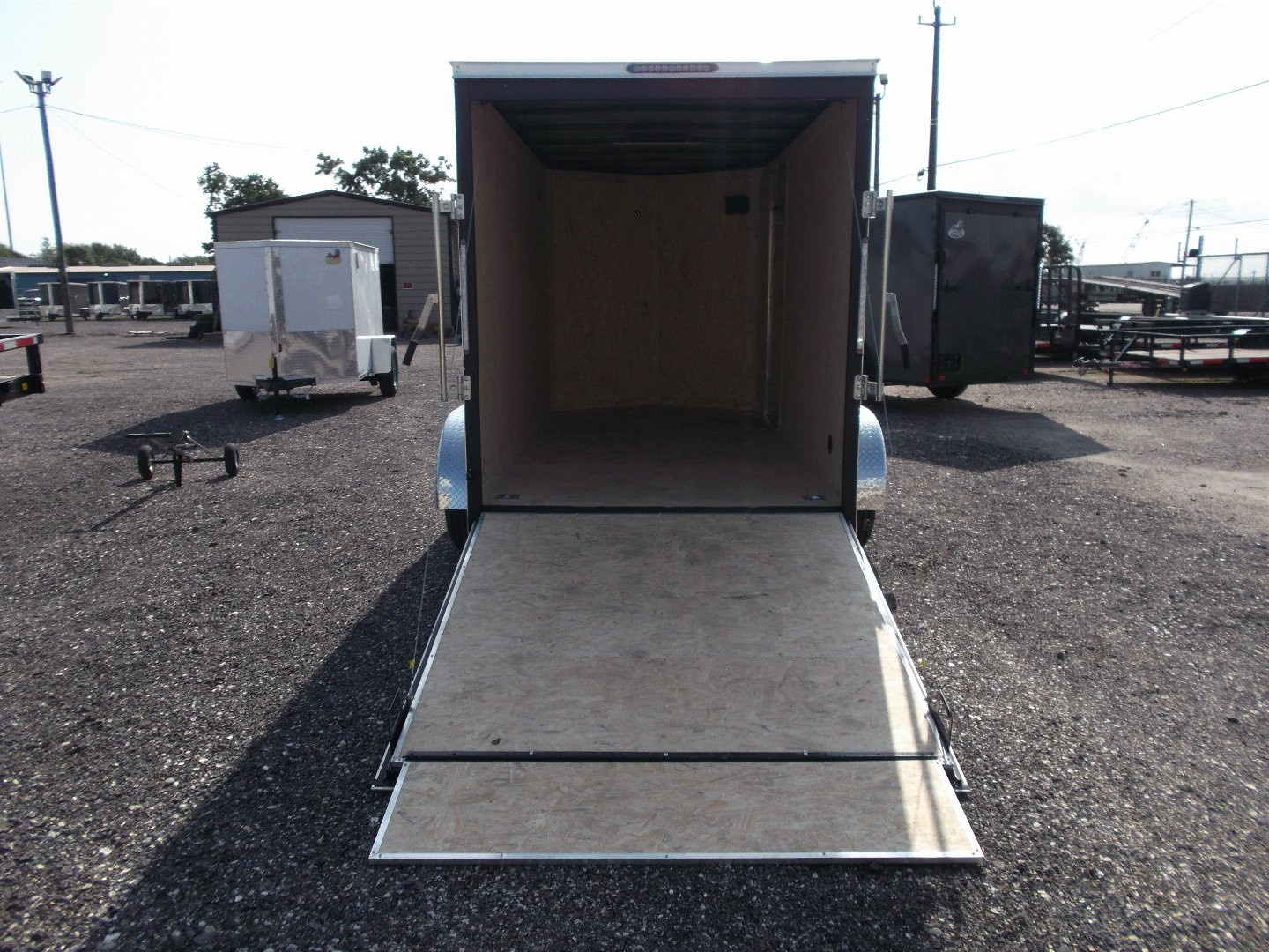 New 2026 Covered Wagon Trailers 6x12 Cargo Trailer / Enclosed Trailer / 6'6" Interior / Extra Wide Ramp / RV Door / .080 White Poly Core Semi-Screwless Exterior