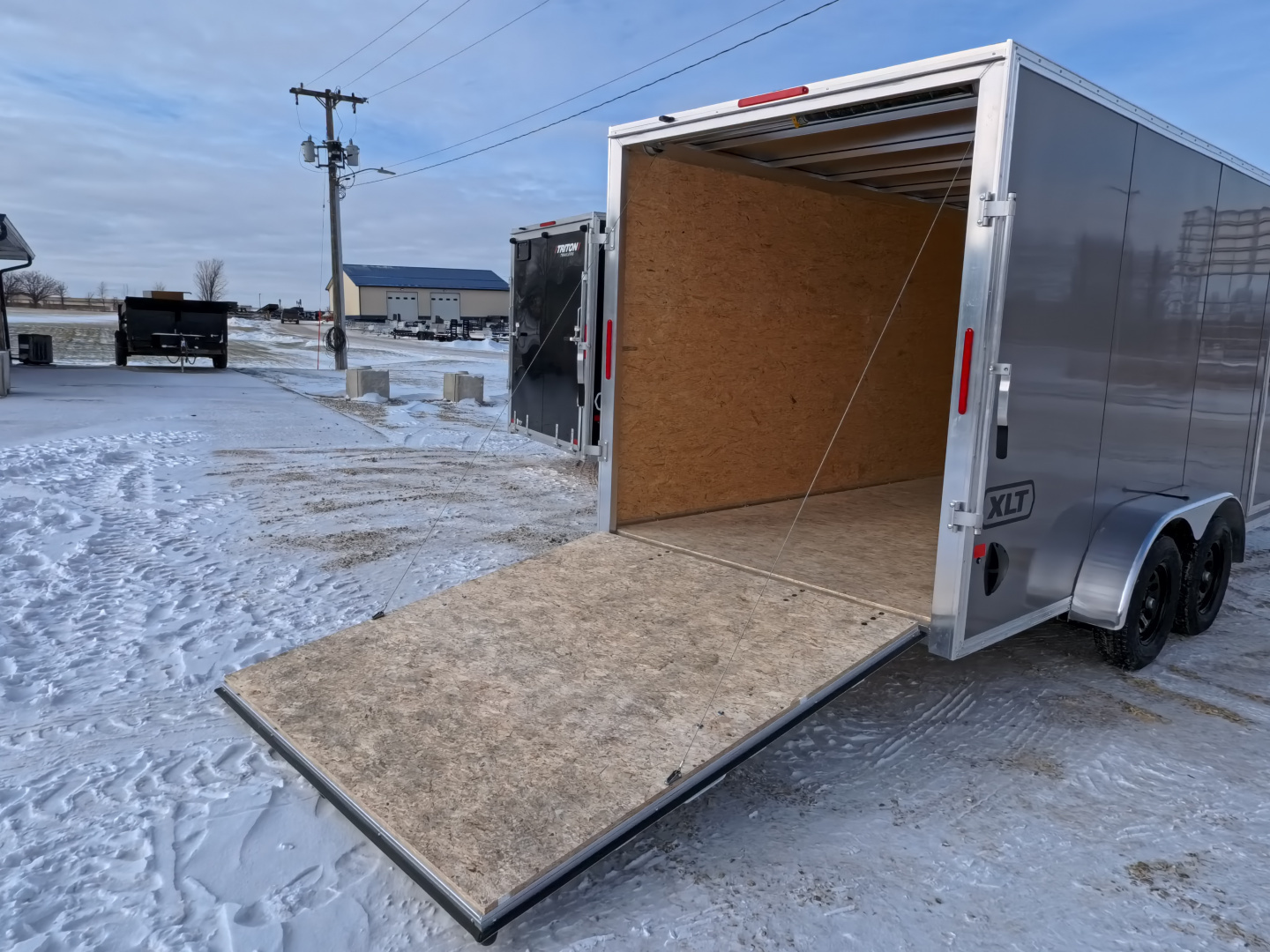 New 2026 Triton 7 x 16 XLT Cargo / Enclosed Trailer With Tandem Spring Axles and Steel Wheels