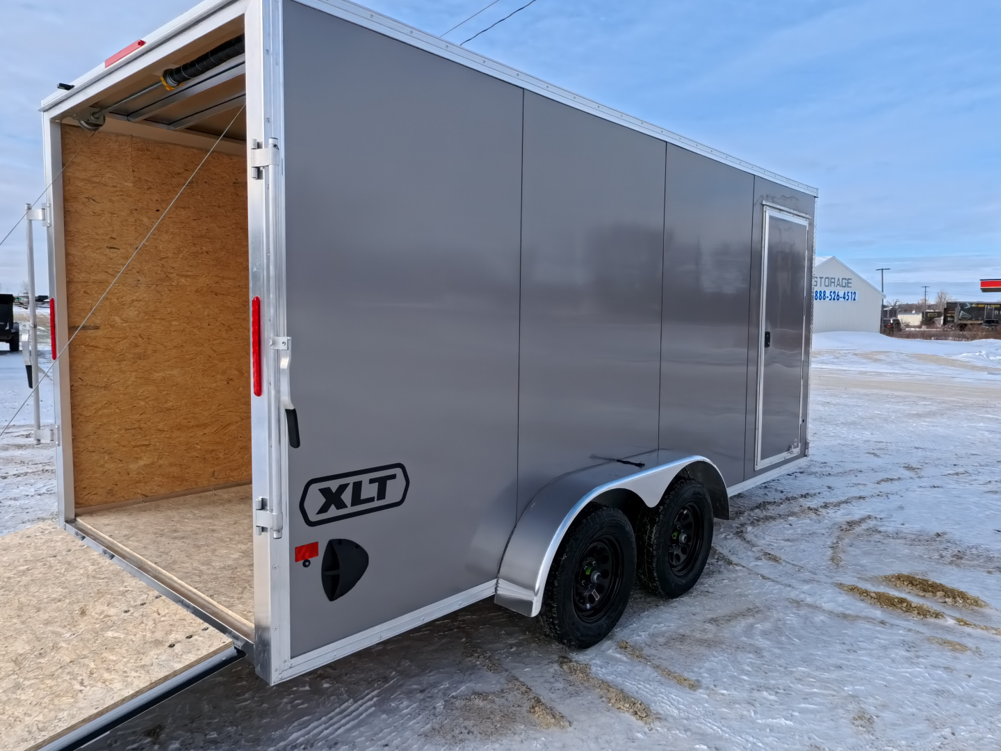 New 2026 Triton 7 x 16 XLT Cargo / Enclosed Trailer With Tandem Spring Axles and Steel Wheels