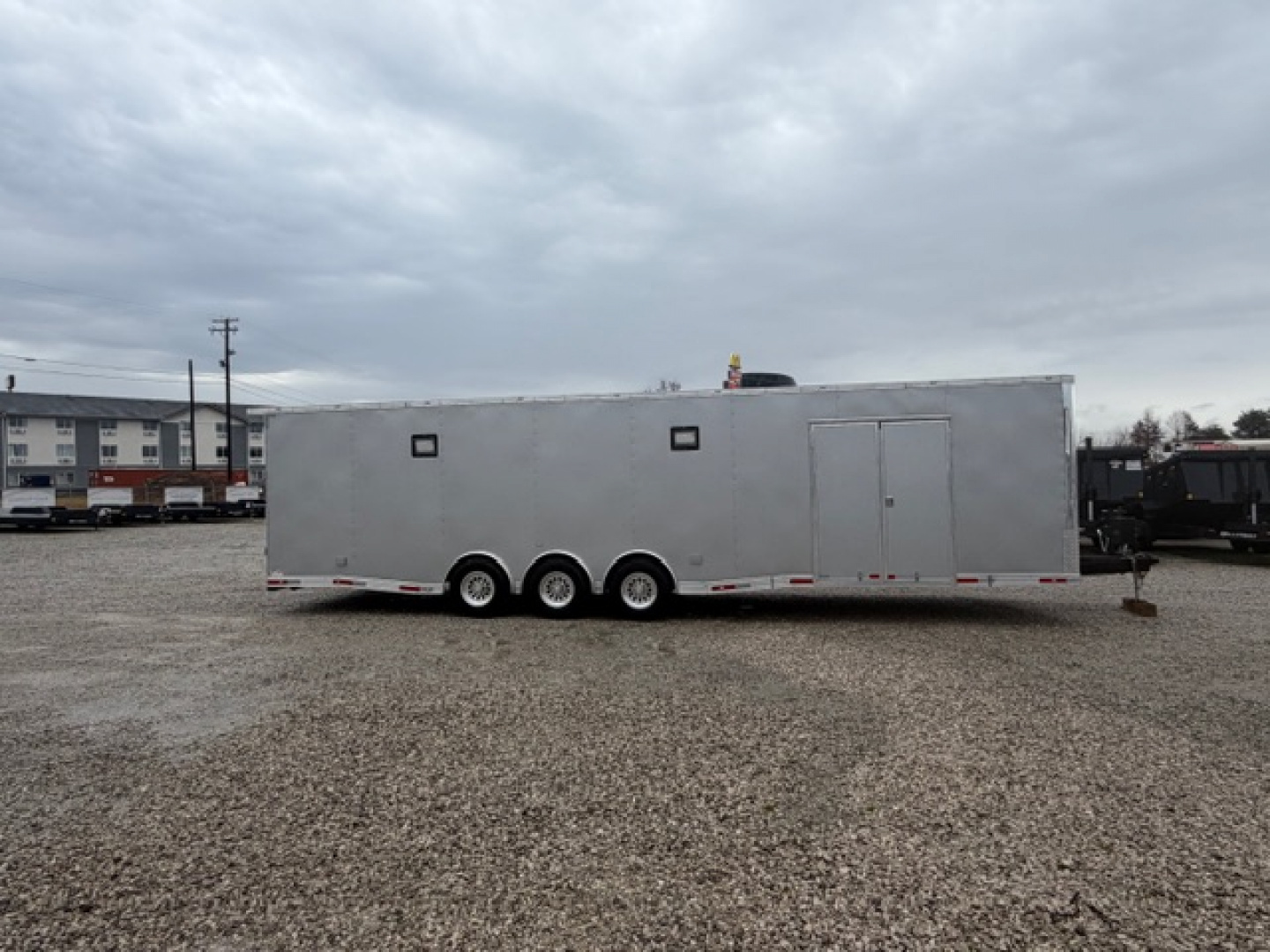 New 2024 Outlaw Trailers 8.5x32 18K Car / Racing Trailer