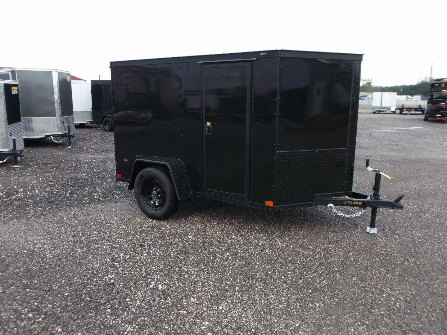 New 2026 Covered Wagon Trailers 5x8 Cargo Trailer / Enclosed Trailer / Ramp / Side Door / .030 Black Semi-Screwless Exterior / Bed Lined Tongue and Frame / Black Out Package