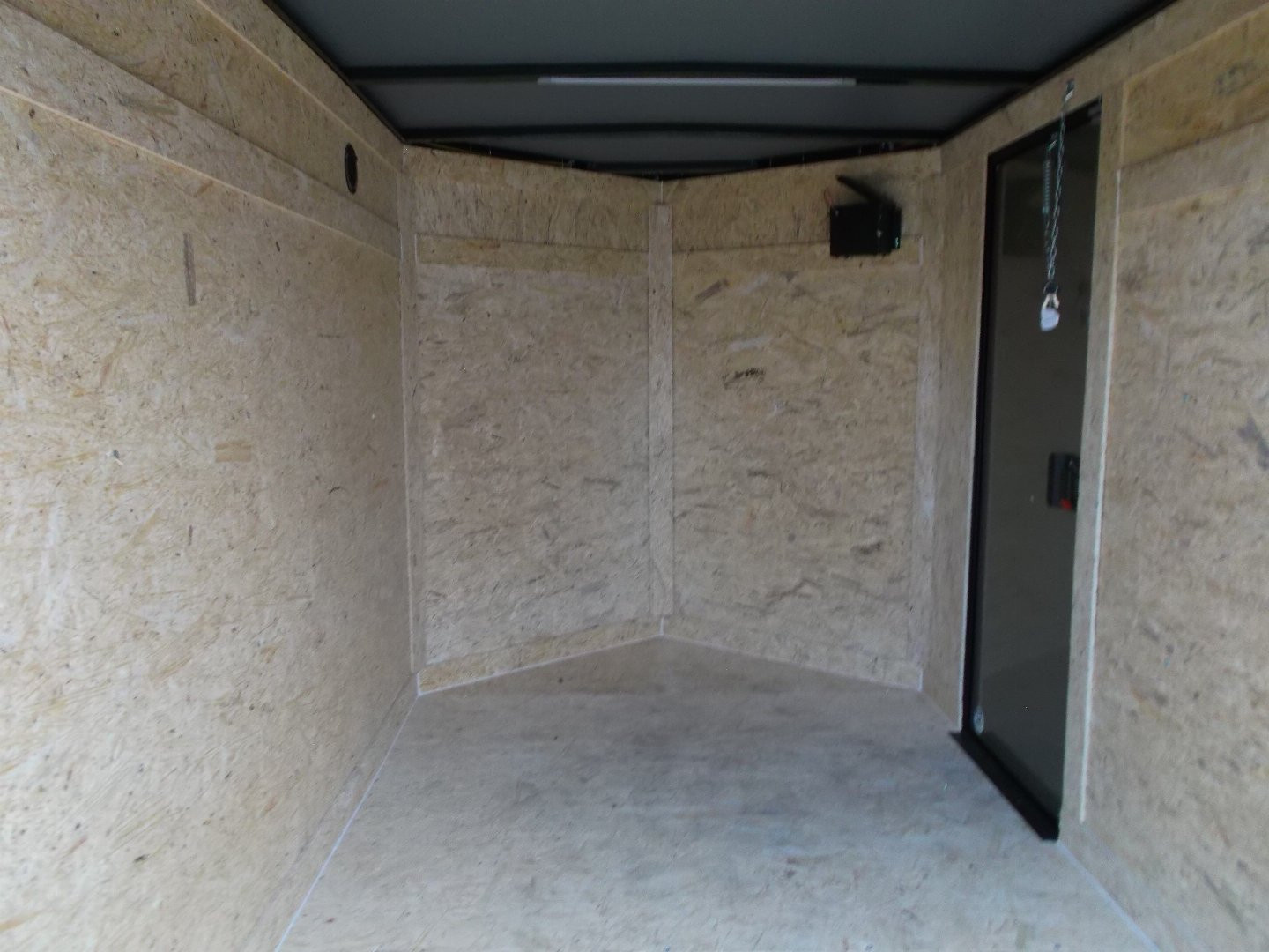 New 2026 Covered Wagon Trailers 5x8 Cargo Trailer / Enclosed Trailer / Ramp / Side Door / .030 Black Semi-Screwless Exterior / Bed Lined Tongue and Frame / Black Out Package