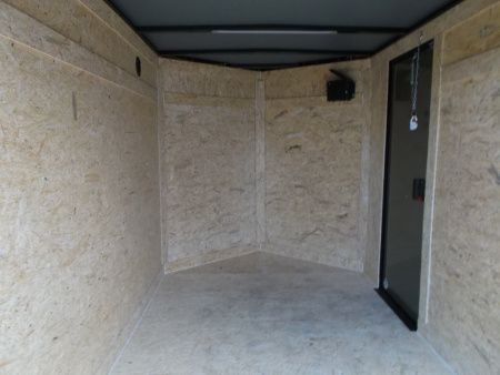 New 2026 Covered Wagon Trailers 5x8 Cargo Trailer / Enclosed Trailer / Ramp / Side Door / .030 Black Semi-Screwless Exterior / Bed Lined Tongue and Frame / Black Out Package