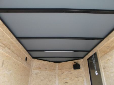 New 2026 Covered Wagon Trailers 5x8 Cargo Trailer / Enclosed Trailer / Ramp / Side Door / .030 Black Semi-Screwless Exterior / Bed Lined Tongue and Frame / Black Out Package