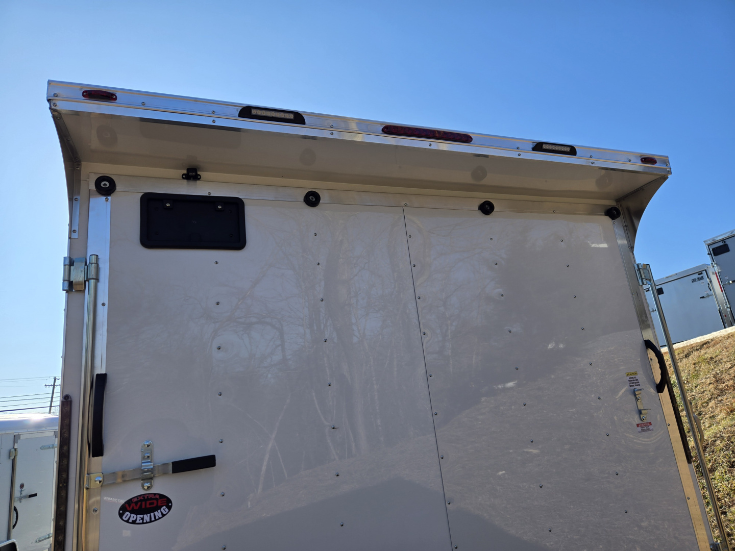 New 8.5 X 24 Homesteader Intrepid HD V-Nose Enclosed Cargo Trailer, 10k GVWR ****White w/.080 PolyCor Side Panels, Spread Axles, Rear Spoiler w/Lights