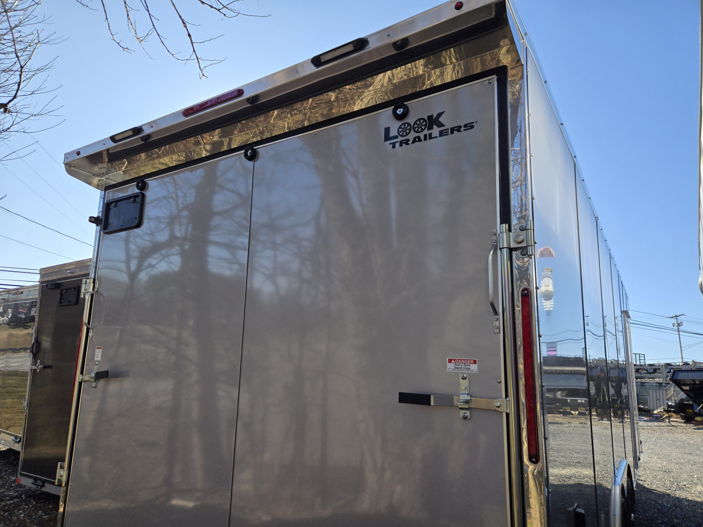 New 8.5 x 24 Look ST DLX V-Nose Enclosed Car Trailer, 10k GVWR ***Silver Composite Panels, 16" OC Walls, 12" Ext. Tongue, Black Alum Wheels, Rear Flare w/Lights