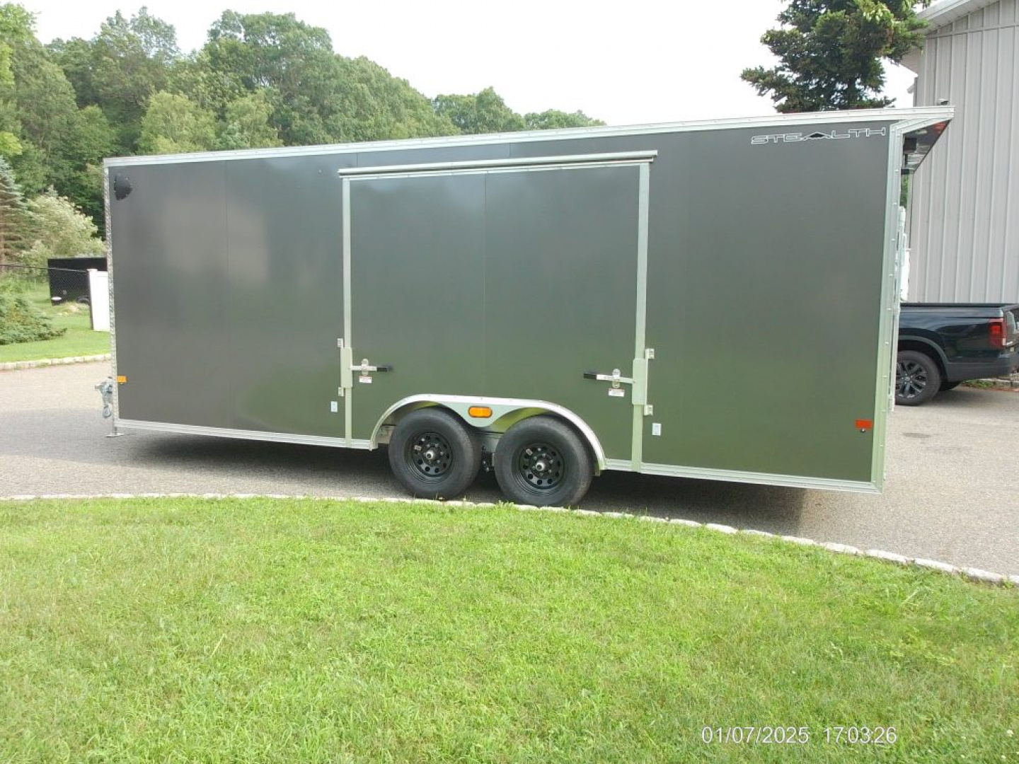New ALCOM STEALTH CAR TRAILER, 8.5X20 V nose, with options. Finished Interior, Cabinets, 9,990 lb. GVWR, our ID#150954 Sale $22,500