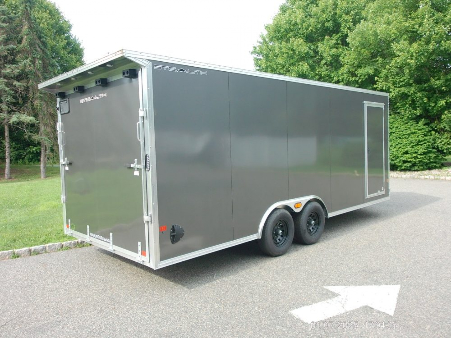 New ALCOM STEALTH CAR TRAILER, 8.5X20 V nose, with options. Finished Interior, Cabinets, 9,990 lb. GVWR, our ID#150954 Sale $22,500